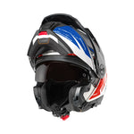 Schuberth E2 Explorer MC-hjälm i blå och röd design, visir uppfällt, visning av interiör och ventilationsfunktioner.